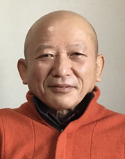 吉田 賢治
